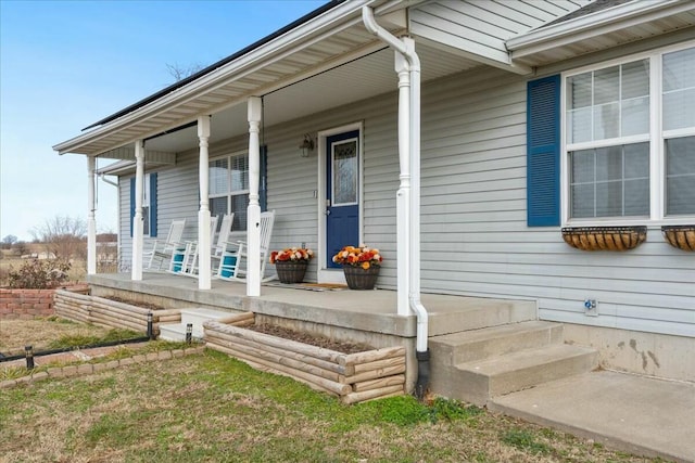 doorway to property featuring a porch