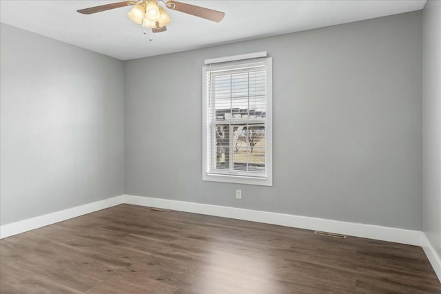 unfurnished room featuring ceiling fan and wood-type flooring