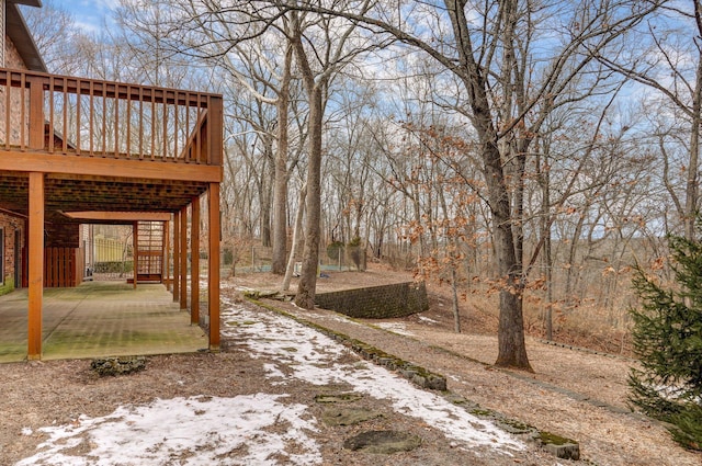 view of yard with a wooden deck