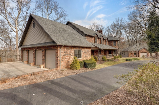 view of property exterior with covered porch