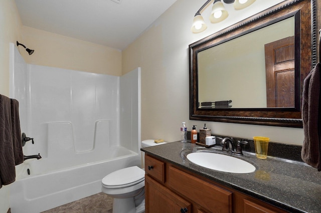 full bathroom with bathtub / shower combination, toilet, vanity, and tile patterned flooring