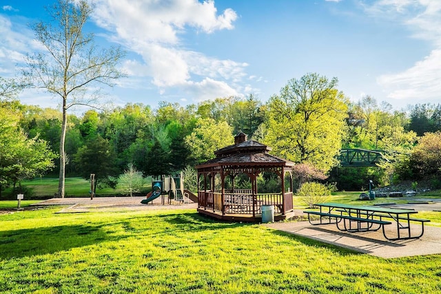 view of community featuring a gazebo, a yard, and a playground