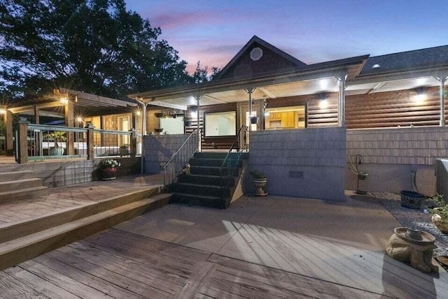 view of front of property featuring a deck