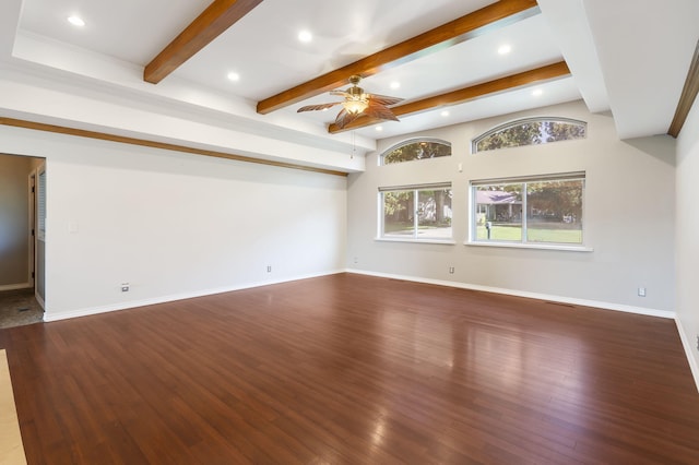 unfurnished room with ceiling fan, hardwood / wood-style floors, and beam ceiling