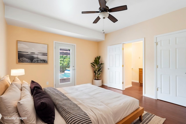 bedroom featuring ceiling fan, access to exterior, and dark wood-type flooring