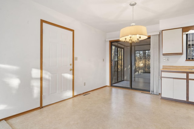 interior space with a chandelier