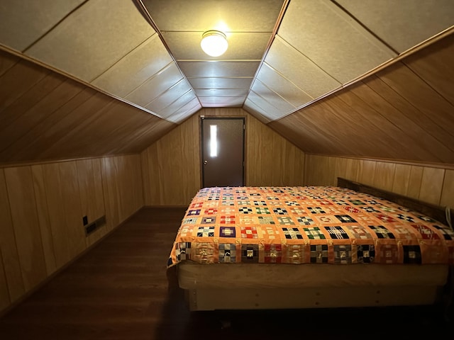 bedroom featuring lofted ceiling