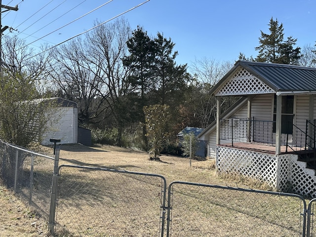 view of yard with an outbuilding and a garage