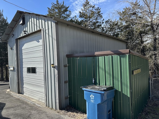 view of outbuilding with a garage