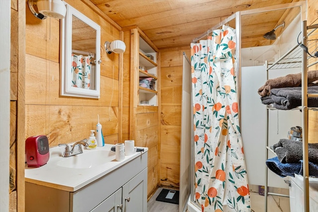 bathroom with wooden ceiling, vanity, a shower with curtain, and wooden walls