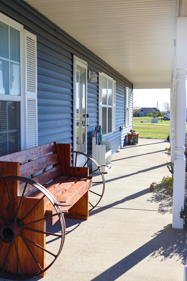 view of patio featuring a porch