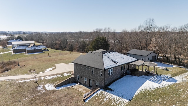 birds eye view of property with a forest view