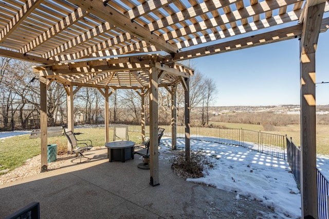 view of patio featuring fence