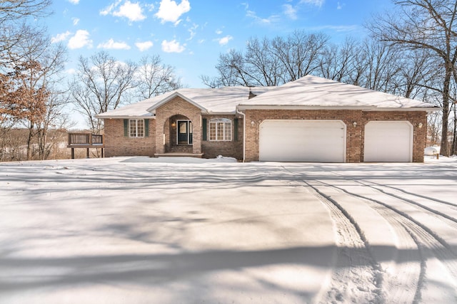 single story home featuring a garage