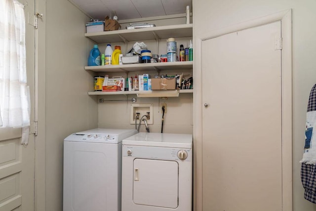 laundry room with washer and dryer