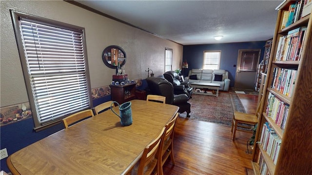 dining room with dark hardwood / wood-style floors