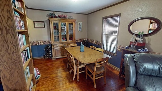 dining area with a healthy amount of sunlight, dark wood-type flooring, and crown molding