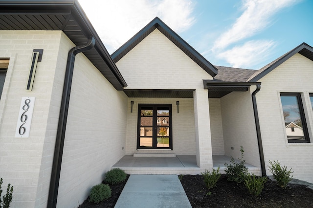 doorway to property featuring a porch