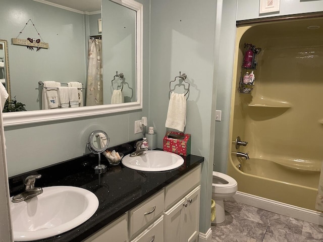 full bathroom featuring toilet, ornamental molding, vanity, and shower / tub combo with curtain