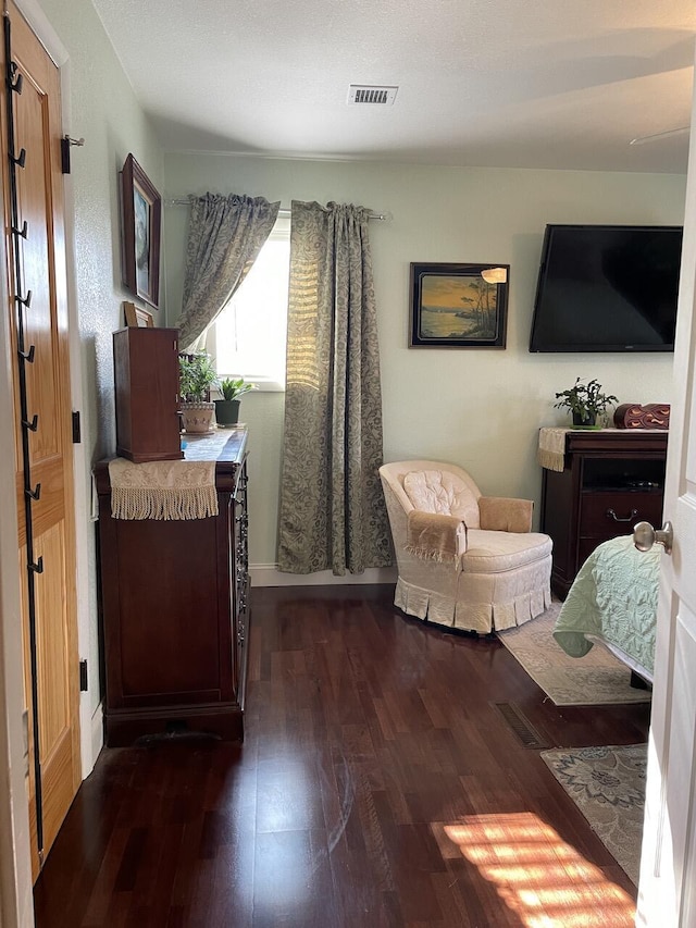 living area with dark hardwood / wood-style floors