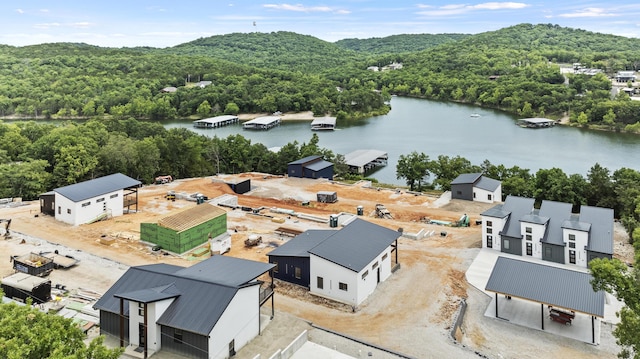 drone / aerial view with a water view