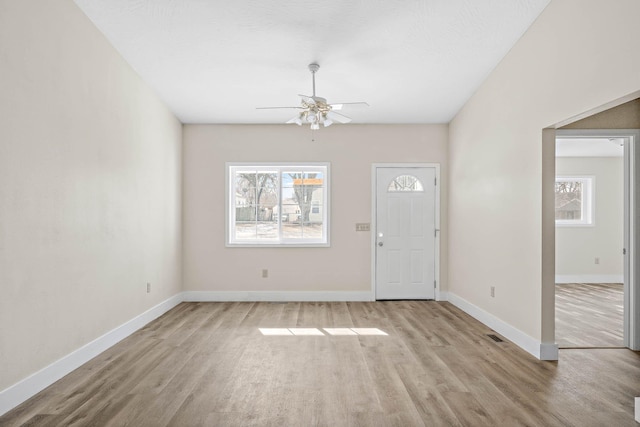 entrance foyer with light hardwood / wood-style floors and ceiling fan