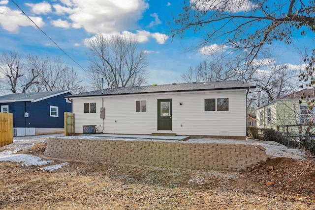 back of house with a patio