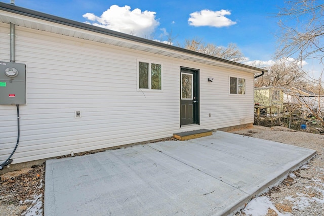 back of property with a patio area