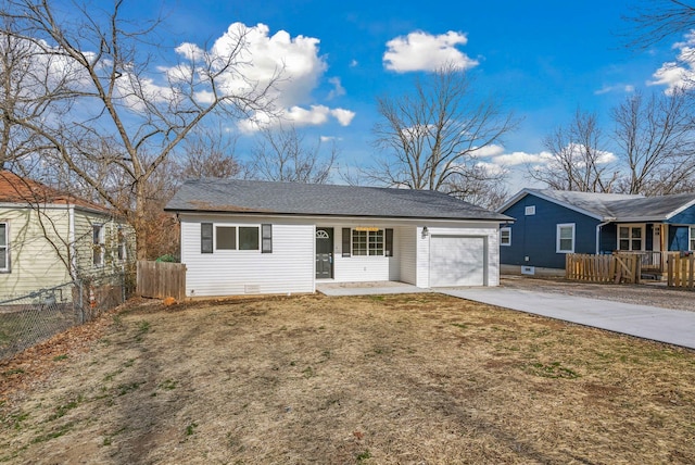 ranch-style home with a garage and a front yard