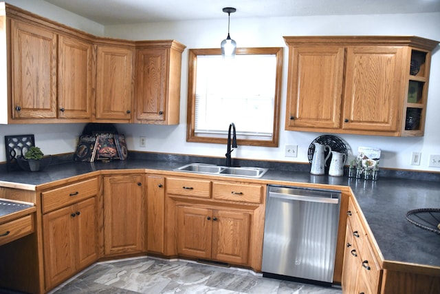 kitchen featuring sink, pendant lighting, and dishwasher