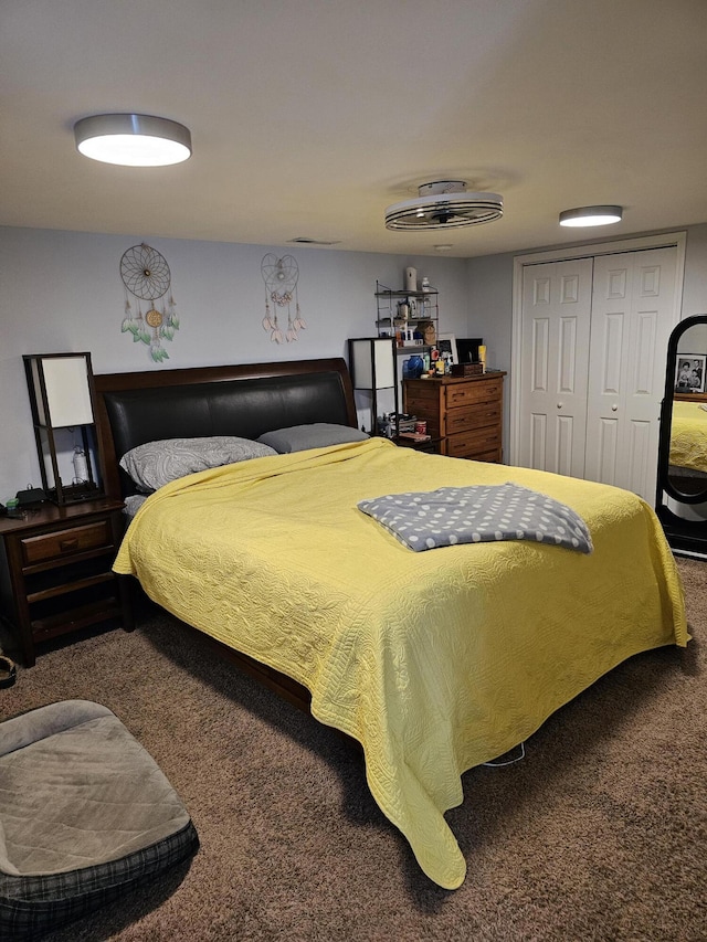 carpeted bedroom with a closet