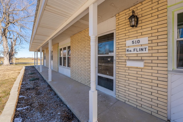 doorway to property with a porch