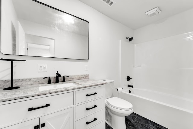 full bathroom with tile patterned flooring, toilet, vanity, and shower / washtub combination