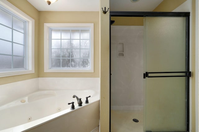 bathroom with independent shower and bath