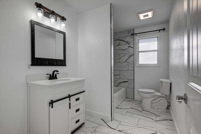 full bathroom featuring toilet, tiled shower / bath, and vanity