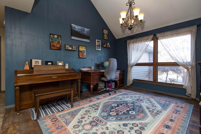 office featuring dark wood-type flooring, high vaulted ceiling, and a notable chandelier