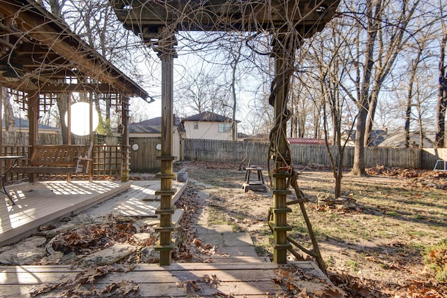 view of yard featuring a wooden deck