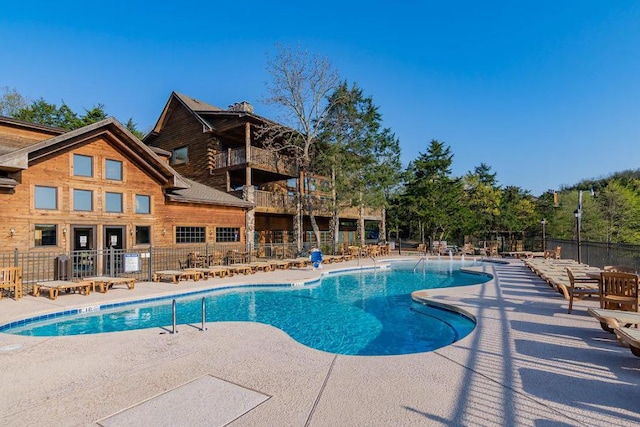 view of pool with a patio area