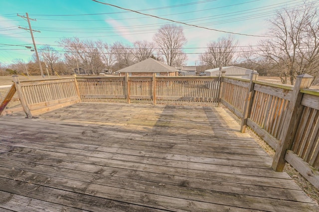 wooden deck with a gazebo