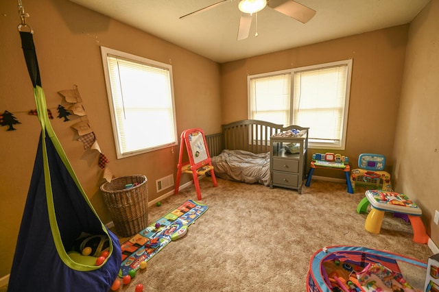 carpeted bedroom featuring ceiling fan