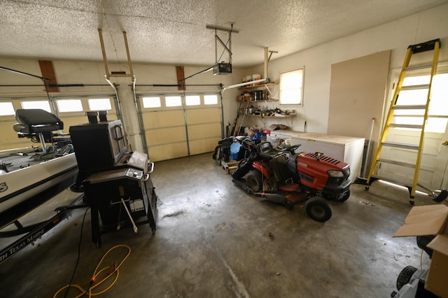 garage featuring a garage door opener