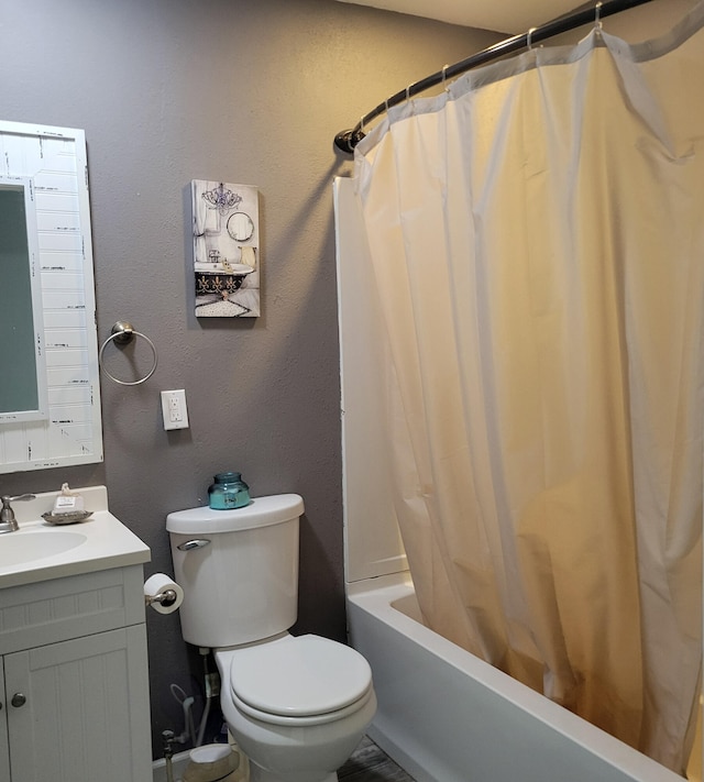 full bathroom with toilet, vanity, and shower / tub combo with curtain