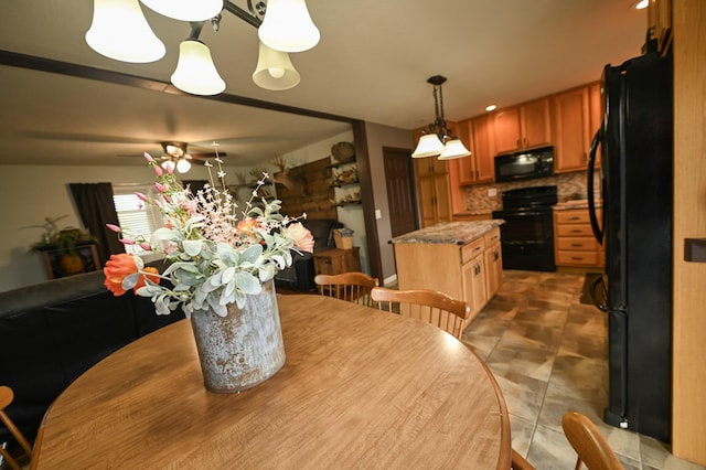 dining room featuring ceiling fan