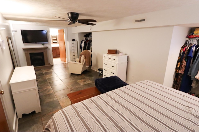 bedroom featuring a closet and ceiling fan