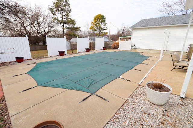 view of pool featuring a patio