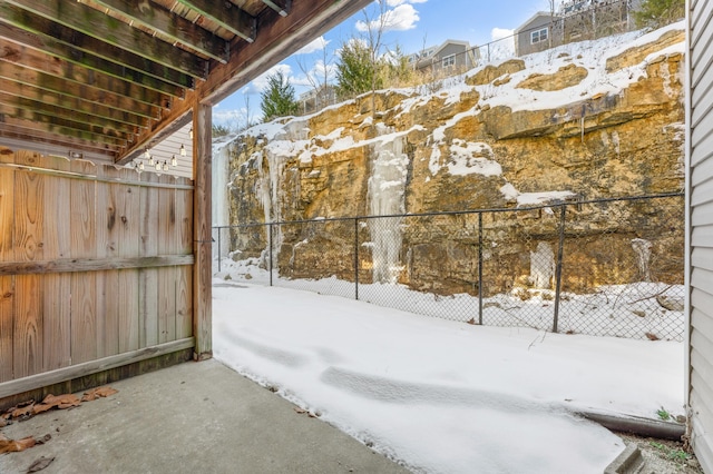 view of yard layered in snow