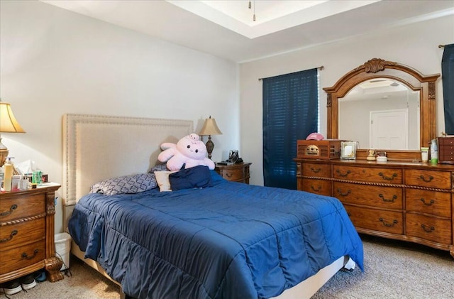 bedroom with light colored carpet