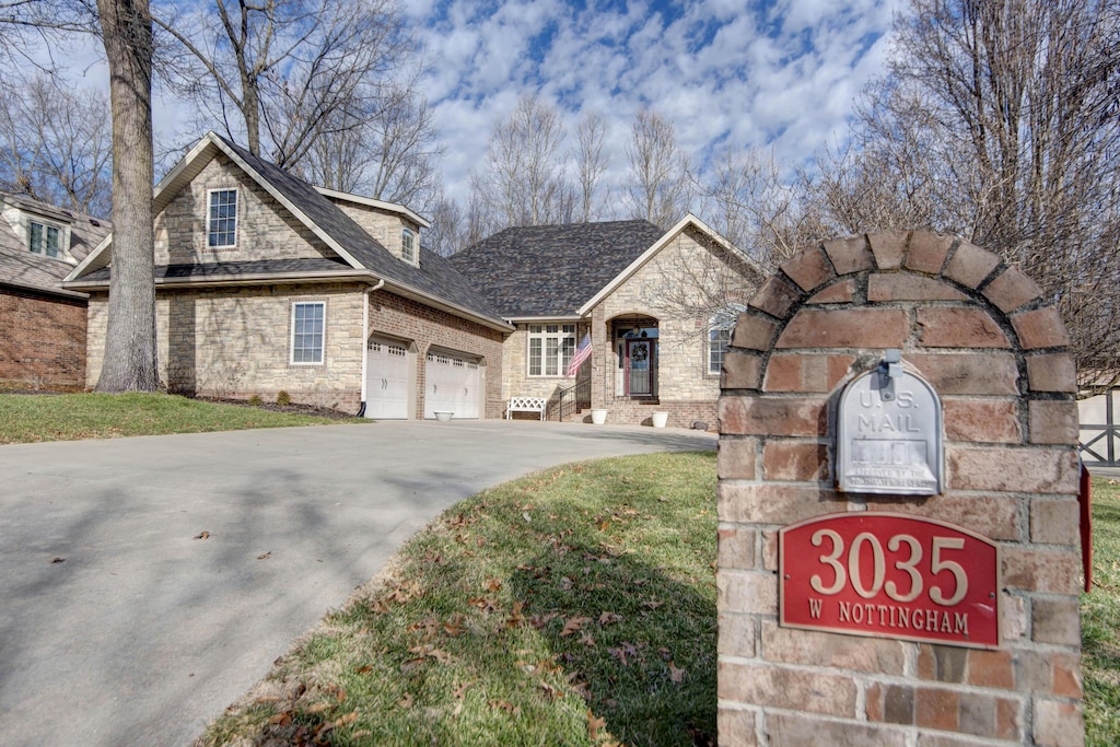 view of front of home with a garage