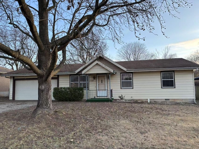 single story home featuring a garage