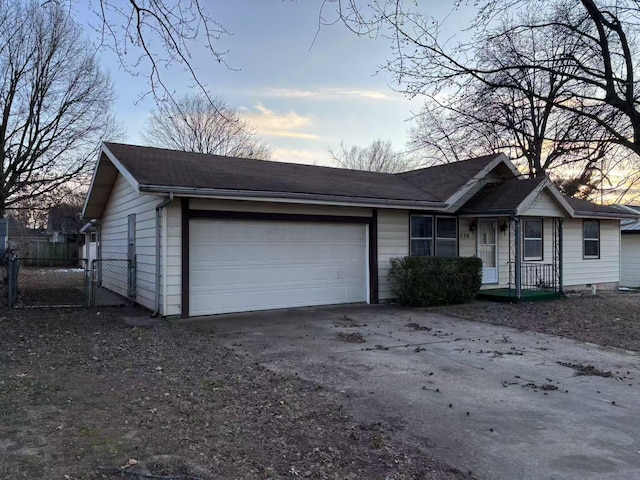 single story home with a garage